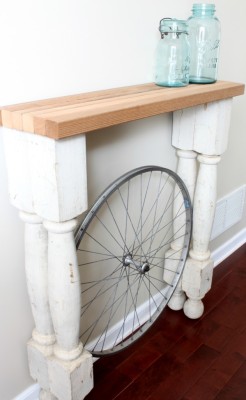 Bicycle Wheel Foyer Table by Reinvented featured in a blog post by EcoGoodz, a used clothing supplier